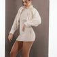 ALISADUDAJ ivory wool draped mini dress, three-quarter view in movement showing sleeve drape