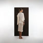 ALISADUDAJ ivory wool draped top and midi skirt set, back view showing draped panel and pencil skirt