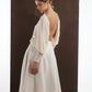 ALISADUDAJ ivory wool open-back drape dress, side back view showing open back and full sleeve