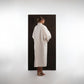 ALISADUDAJ ivory wool cocoon coat, back view showing full cocoon silhouette and dropped shoulders