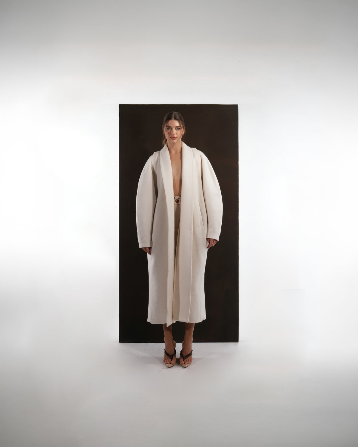 ALISADUDAJ ivory wool shawl-collar cocoon coat, front view, full length, worn open