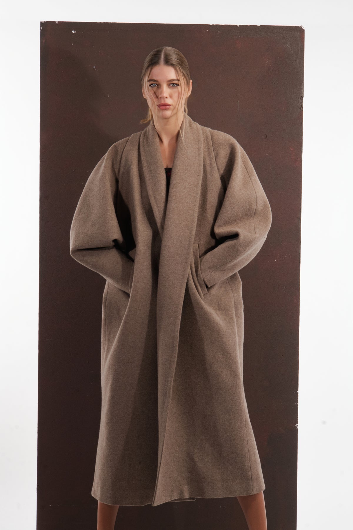 ALISADUDAJ taupe wool oversized coat, front view showing dropped shoulders and deep armholes