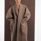 ALISADUDAJ taupe wool oversized coat, front view with hands in pockets showing wide shawl lapels