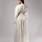 ALISADUDAJ white linen corseted maxi dress, back view showing gathered bodice, corset panel and full skirt