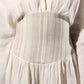 ALISADUDAJ white linen corseted maxi dress, close-up of striped woven corset panel and gathered skirt