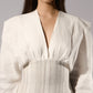 ALISADUDAJ white linen corseted maxi dress, front close-up of deep V neckline and gathered bodice