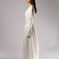 ALISADUDAJ white linen corseted maxi dress, side profile showing structured shoulders and long sleeves