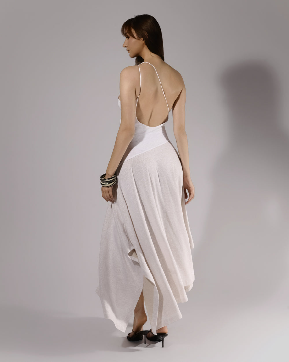 ALISADUDAJ white linen strappy maxi dress, back view showing open back with crossed thin straps