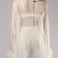 ALISADUDAJ white sheer silk duster, back close-up of ruffled collar and embroidered motifs, silk and linen