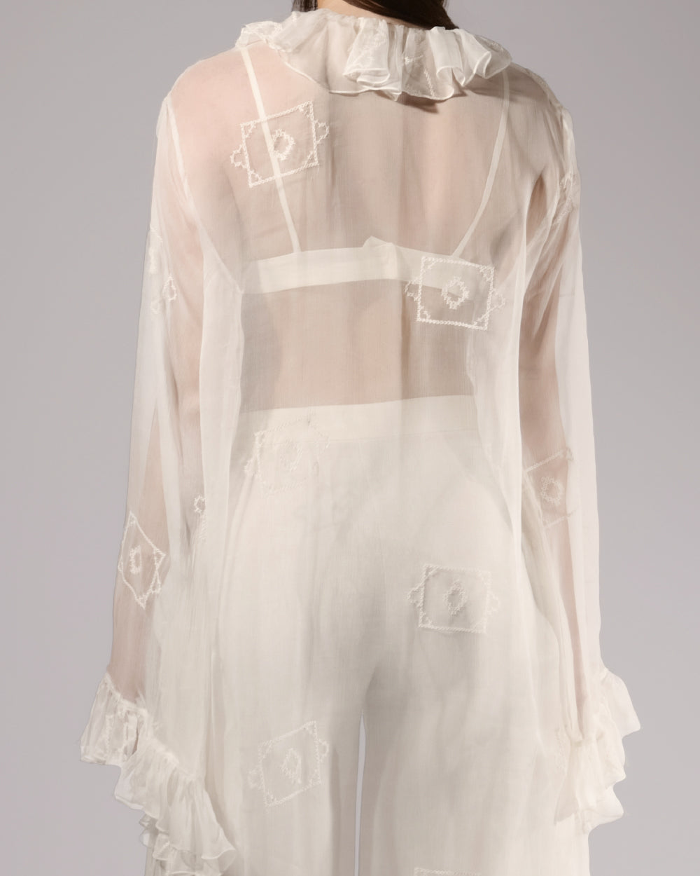 ALISADUDAJ white sheer silk duster, back close-up of ruffled collar and embroidered motifs, silk and linen