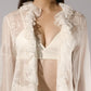 ALISADUDAJ white sheer silk three-piece set, close-up of ruffled duster front and linen bralette top