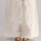 ALISADUDAJ white sheer silk duster, close-up of ruffled trim and embroidered squares over linen trousers