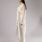 ALISADUDAJ white sheer silk three-piece set, side profile showing ruffled duster and wide-leg trousers